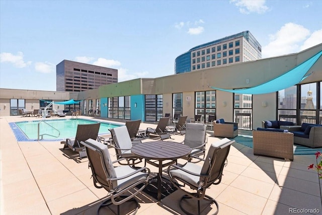 1625 Larimer St Unit 1605, Denver, CO 80202 - view of patio with a community pool and an outdoor living space