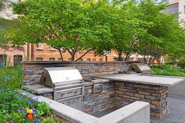 1625 Larimer St Unit 1605, Denver, CO 80202 - view of patio featuring an outdoor kitchen