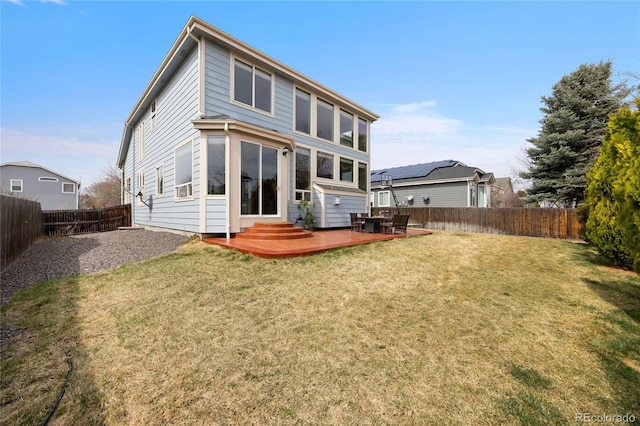 13078 Monaco Way, Thornton, CO 80602 - back of house with a wooden deck and entry steps