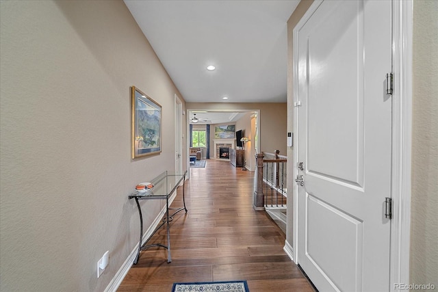 23871 E Ontario Pl, Aurora, CO 80016 - hall with dark wood-style floors, recessed lighting, and an upstairs landing