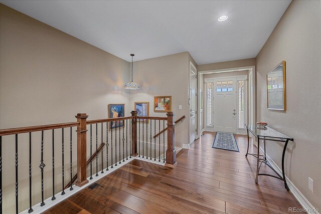 23871 E Ontario Pl, Aurora, CO 80016 - foyer entrance with wood-type flooring and recessed lighting