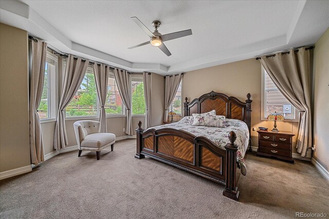 23871 E Ontario Pl, Aurora, CO 80016 - carpeted bedroom featuring multiple windows and ceiling fan