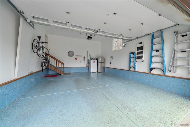 23871 E Ontario Pl, Aurora, CO 80016 - garage with a garage door opener and water heater
