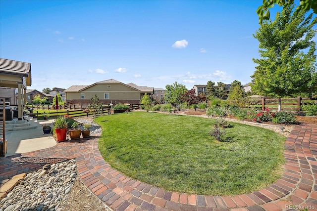 23871 E Ontario Pl, Aurora, CO 80016 - view of yard featuring a residential view and a patio area