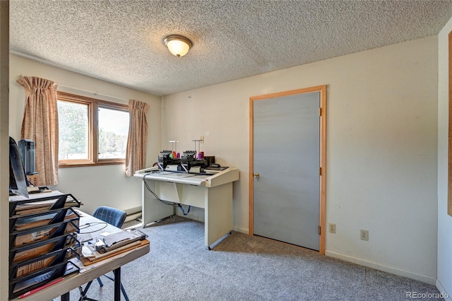 office with light carpet and a textured ceiling