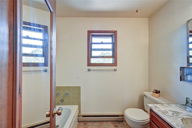 bathroom featuring a baseboard radiator, a bath, tile patterned floors, toilet, and vanity