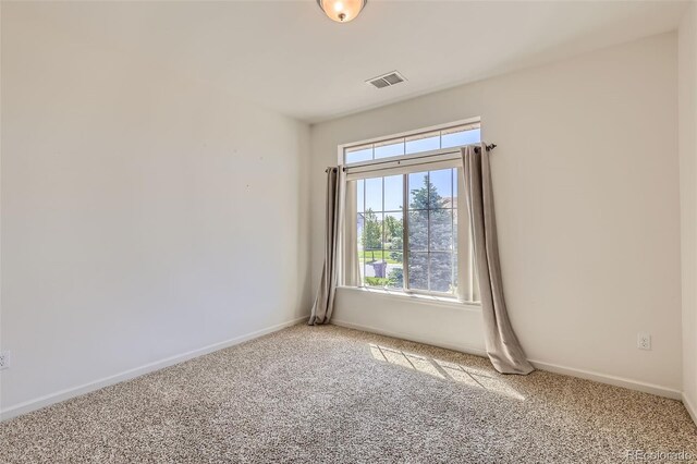19753 E 54th Ave, Denver, CO 80249 - unfurnished room with light colored carpet and baseboards