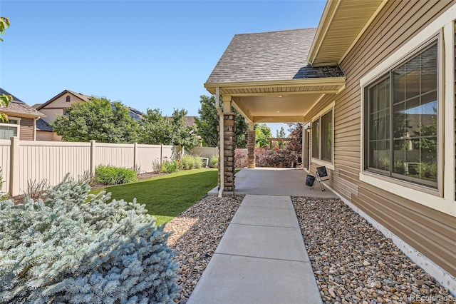 19753 E 54th Ave, Denver, CO 80249 - fenced backyard with a patio