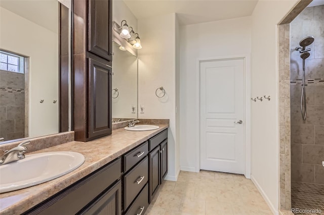 19753 E 54th Ave, Denver, CO 80249 - bathroom with double vanity and a tile shower