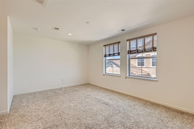 19753 E 54th Ave, Denver, CO 80249 - carpeted spare room featuring baseboards and recessed lighting