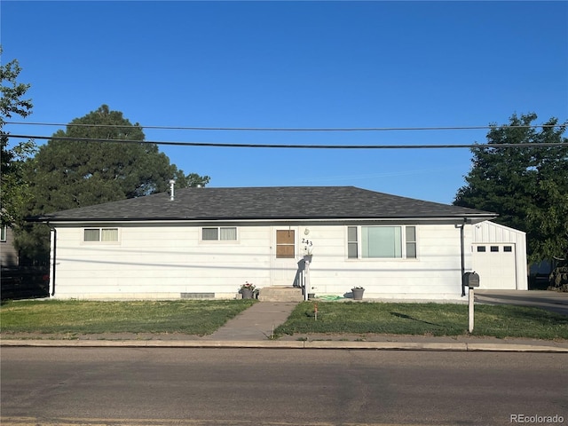 single story home with a garage and a front yard