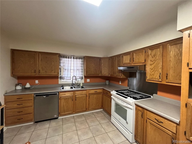 kitchen featuring sink, light tile patterned floors, white gas stove, and dishwasher