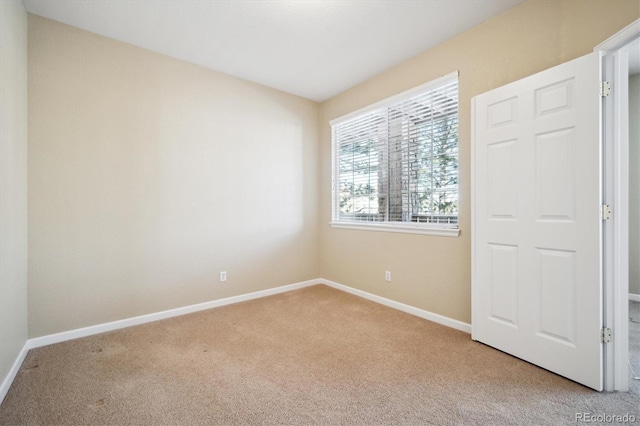 view of carpeted spare room