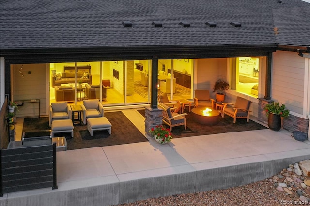 view of patio / terrace featuring an outdoor fire pit