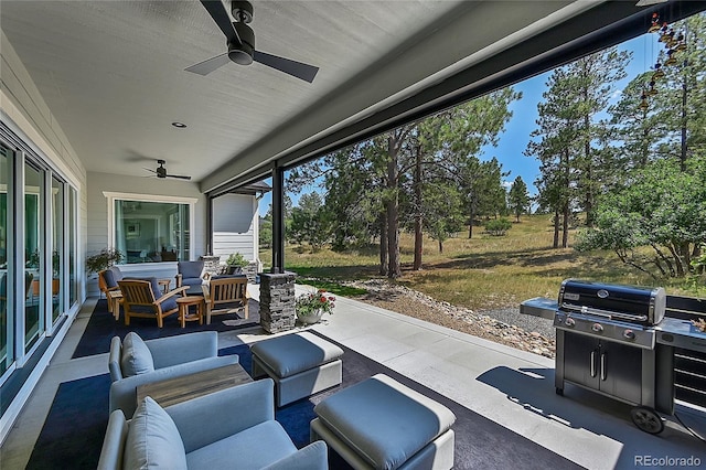 view of patio featuring outdoor lounge area, a ceiling fan, and area for grilling