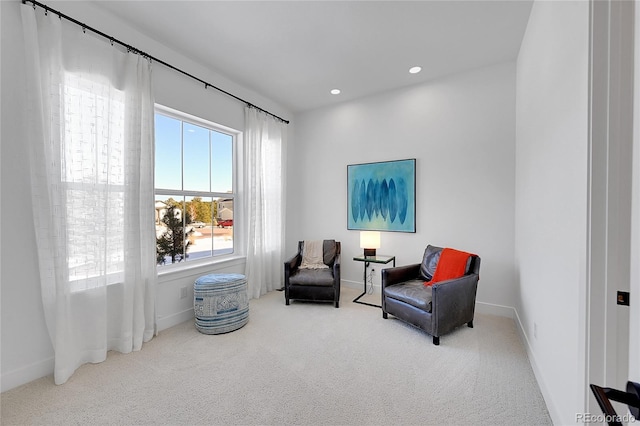 sitting room featuring carpet flooring, baseboards, and recessed lighting