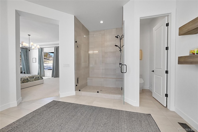 9228 Lone Timber Ct, Parker, CO 80134 - bathroom with tile patterned flooring, ensuite bathroom, a stall shower, a chandelier, and recessed lighting
