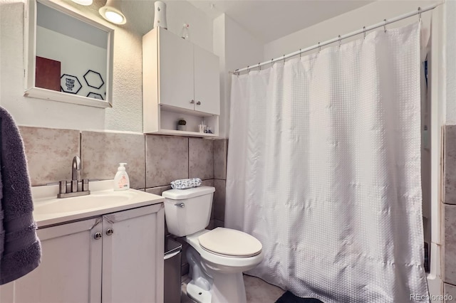 1958 Cathay Ct, Aurora, CO 80011 - full bathroom featuring tile walls, toilet, vanity, curtained shower, and wainscoting