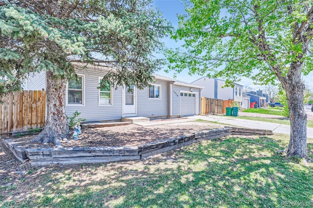 1958 Cathay Ct, Aurora, CO 80011 - view of front facade featuring driveway and a garage