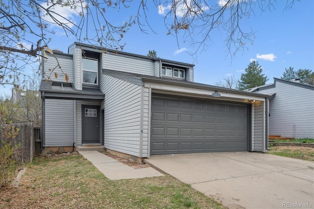 17634 E Ohio Cir, Aurora, CO 80017 - mid-century inspired home featuring a garage and driveway