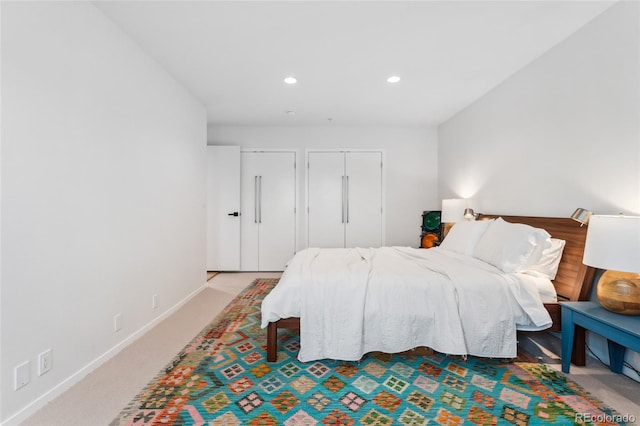 bedroom with light carpet