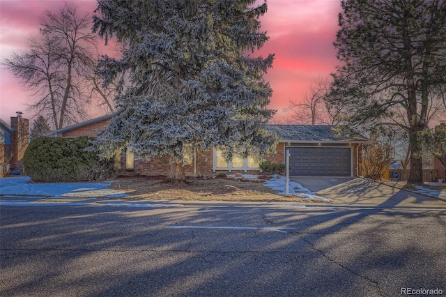 view of front of home featuring a garage