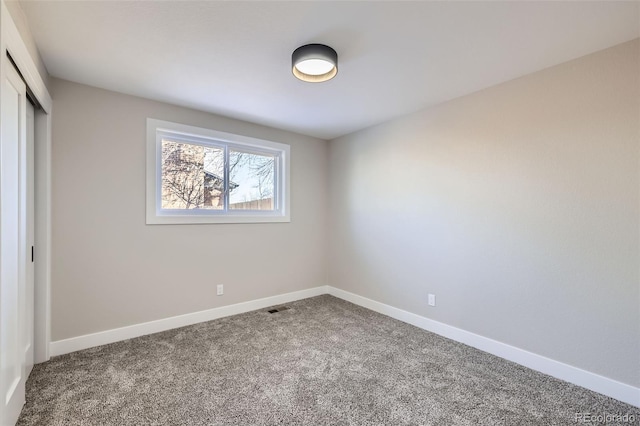 view of carpeted spare room