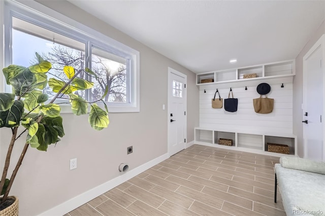 mudroom with light wood-type flooring