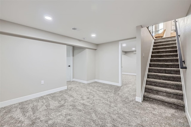 basement featuring carpet floors