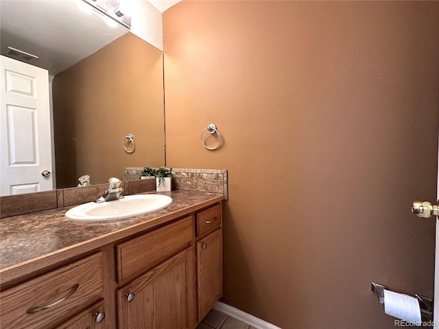 bathroom with tile patterned floors, vanity, and visible vents