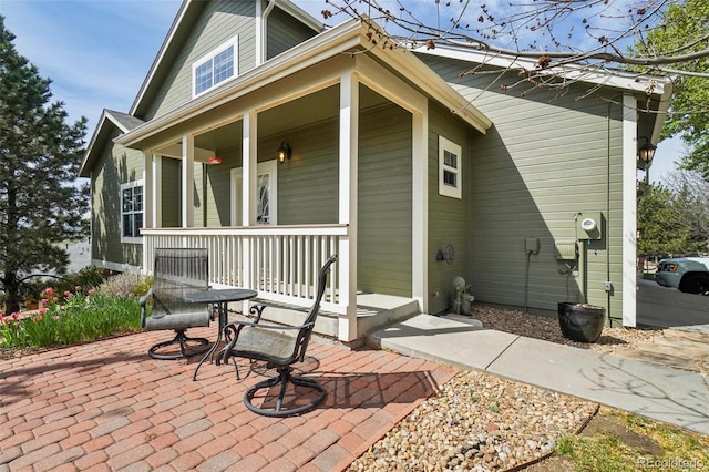 6701 W Yale Ave, Lakewood, CO 80227 - rear view of property with covered porch