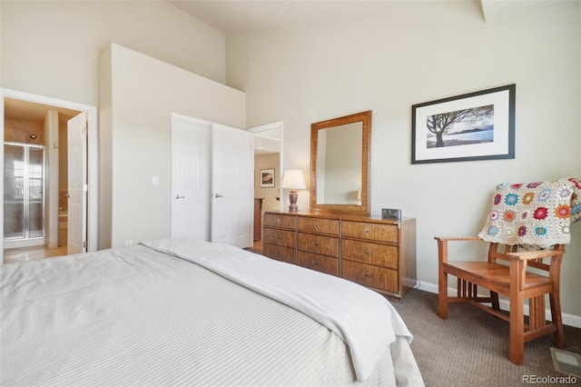 6701 W Yale Ave, Lakewood, CO 80227 - bedroom with a high ceiling, light colored carpet, baseboards, and ensuite bathroom