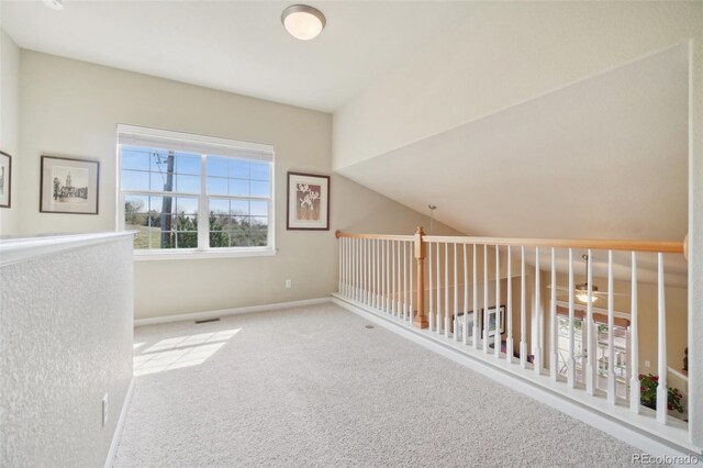 6701 W Yale Ave, Lakewood, CO 80227 - additional living space with carpet floors and baseboards