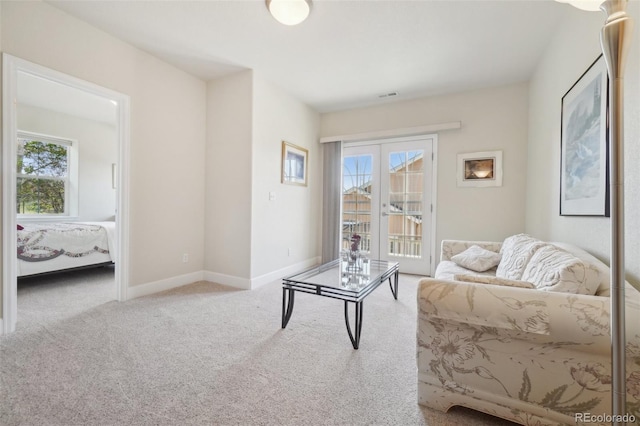 6701 W Yale Ave, Lakewood, CO 80227 - carpeted living area featuring baseboards