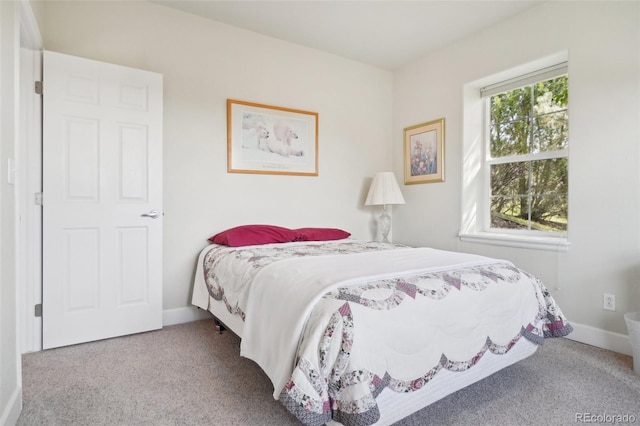 6701 W Yale Ave, Lakewood, CO 80227 - bedroom with carpet floors and baseboards