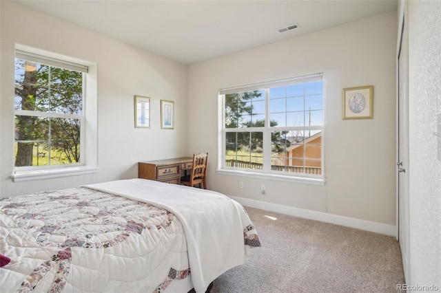 6701 W Yale Ave, Lakewood, CO 80227 - bedroom featuring carpet floors and baseboards
