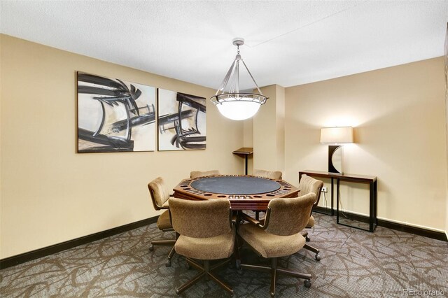 1020 15th St Unit 17K, Denver, CO 80202 - dining space featuring baseboards and carpet floors