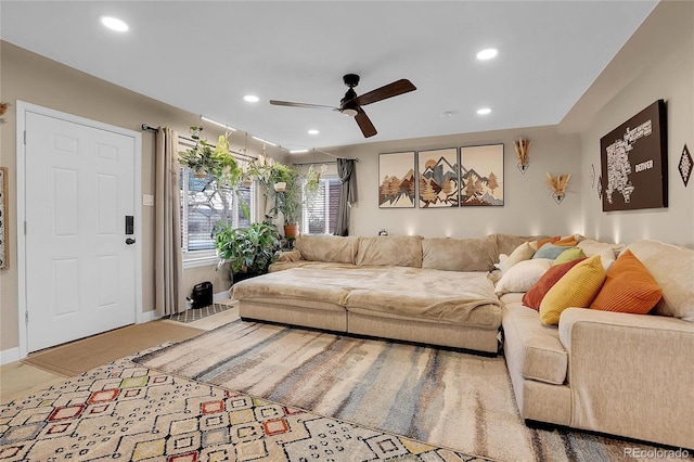 living room featuring ceiling fan