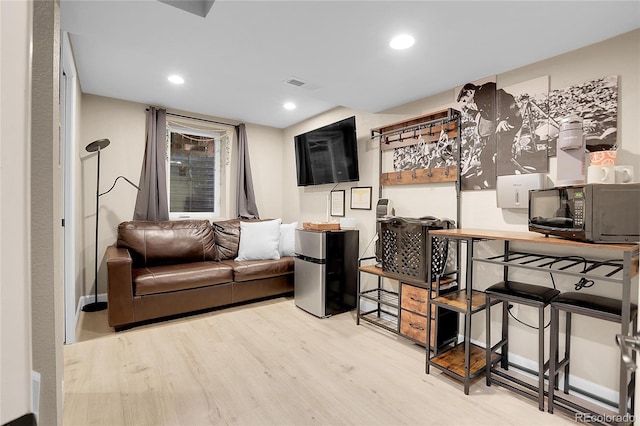 living room featuring light wood-type flooring