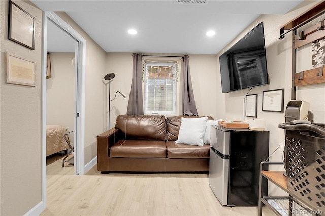 living room featuring light hardwood / wood-style floors