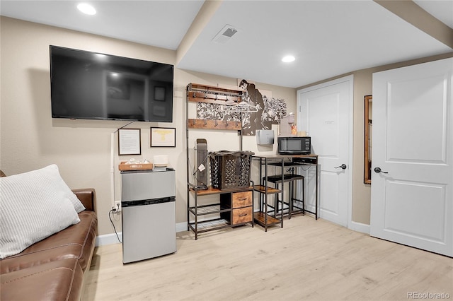 office area featuring light hardwood / wood-style floors