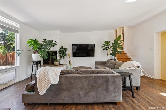 1497 S Garfield St, Denver, CO 80210 - living room with dark wood-style flooring and stairway