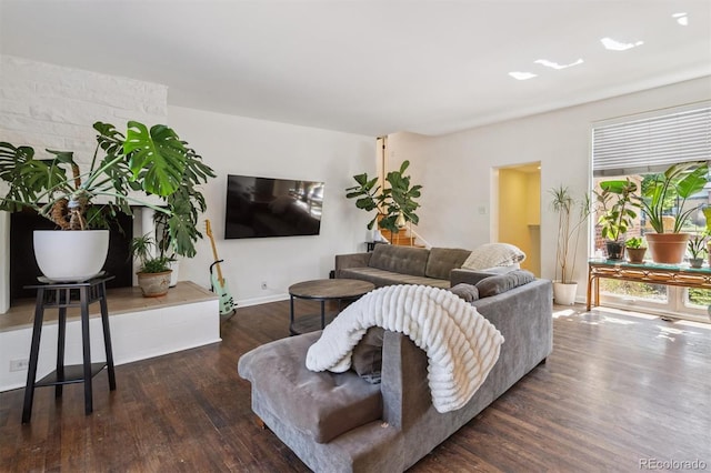 1497 S Garfield St, Denver, CO 80210 - living room featuring wood finished floors and baseboards