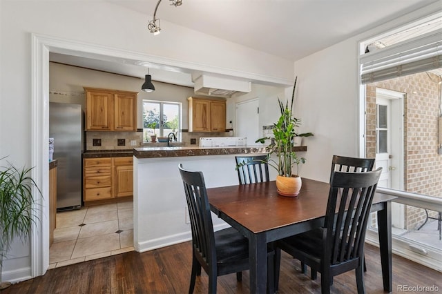 1497 S Garfield St, Denver, CO 80210 - dining room featuring wood finished floors