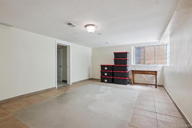 1497 S Garfield St, Denver, CO 80210 - tiled spare room with baseboards