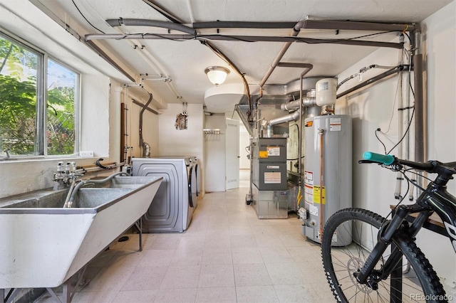 1497 S Garfield St, Denver, CO 80210 - laundry area with washer and clothes dryer, water heater, and heating unit