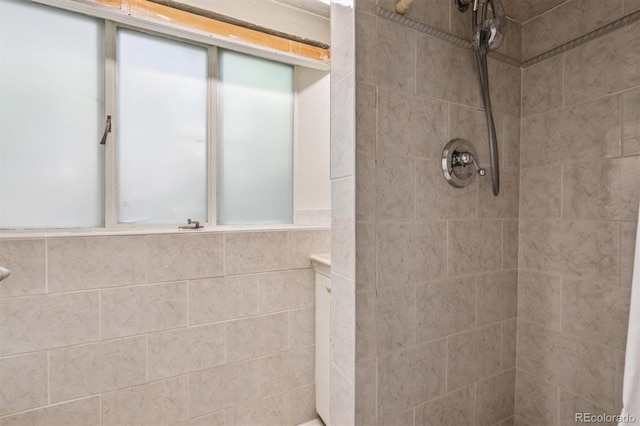 1497 S Garfield St, Denver, CO 80210 - bathroom featuring tiled shower