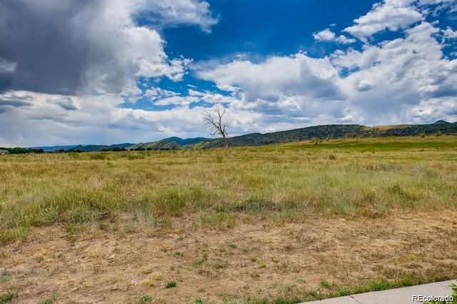 view of mountain feature featuring a rural view