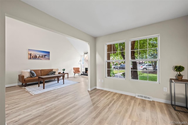 13025 E Bethany Pl, Aurora, CO 80014 - living room with light wood-style flooring and baseboards