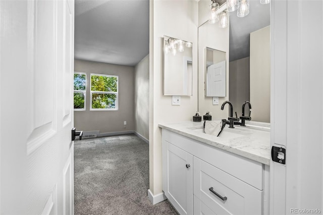 13025 E Bethany Pl, Aurora, CO 80014 - bathroom with vanity and baseboards